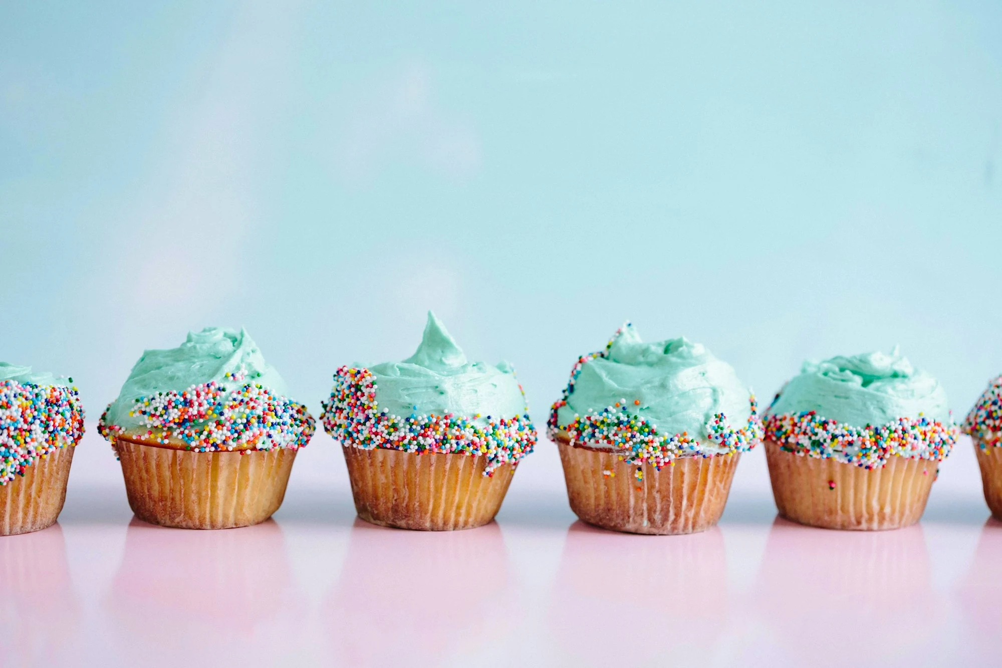 Row of vanilla cupcakes